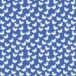 White butterflies on royal blue (mini)