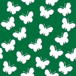 White butterflies on deep green (medium)