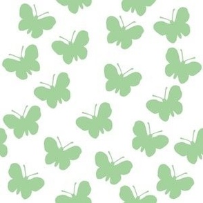 Green butterflies on white (medium)