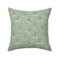 Island vibes waves and surf girls hawaii inspired women with palm trees surf boards and sun blush pink yellow on sage green