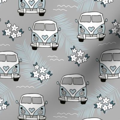 Going on a surf trip boho seventies vintage style van and flowers blue gray 