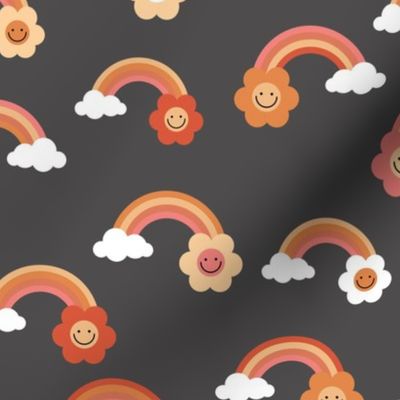 Smiley rainbow flower power vintage style seventies rainbows and flowers orange pink red on charcoal