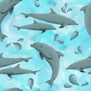 dolphins on ocean blue