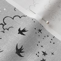 Folk Birds on Gray Linen | Block print plants, birds, suns, moons and stars.