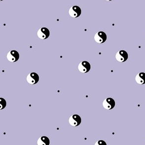 Retro Yin Yang black and white vintage Chinese balance yoga symbol and spots on lilac purple