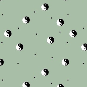 Retro Yin Yang black and white vintage Chinese balance yoga symbol and spots on olive green sage