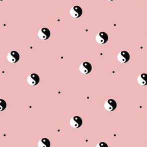 Retro Yin Yang black and white vintage Chinese balance yoga symbol and spots on rose pink 