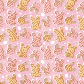 Tiny scale // Hippity hoppity Easter Mexican bunny conchas on it’s way! // pastel pink background pink and yellow pan dulce 