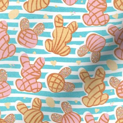 Small scale // Hippity hoppity Easter Mexican bunny conchas on it’s way! // seagull blue stripes background pink and yellow pan dulce 