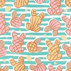 Small scale // Hippity hoppity Easter Mexican bunny conchas on it’s way! // mint stripes background pink and yellow pan dulce 