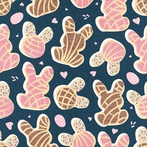 Small scale // Hippity hoppity Easter Mexican bunny conchas on it’s way! // nile blue background pink and brown pan dulce 