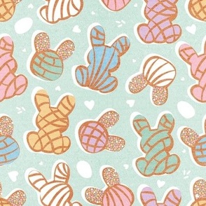 Small scale // Hippity hoppity Easter Mexican bunny conchas on it’s way! // aqua background multicoloured pan dulce
