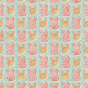 Tiny scale // Hoppy Easter // aqua linen texture background pink and yellow Mexican pan dulce bunny conchas