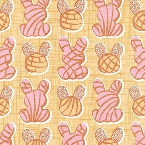 Small scale // Hoppy Easter // pale yellow linen texture background pink and yellow Mexican pan dulce bunny conchas