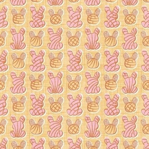 Tiny scale // Hoppy Easter // pale yellow linen texture background pink and yellow Mexican pan dulce bunny conchas