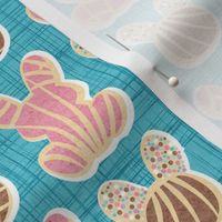 Small scale // Hoppy Easter // seagull blue linen texture background pink and brown Mexican pan dulce bunny conchas