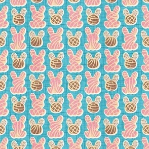 Tiny scale // Hoppy Easter // seagull blue linen texture background pink and brown Mexican pan dulce bunny conchas