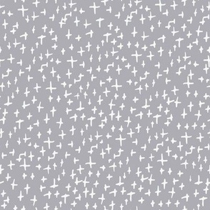 white crosses on gray background