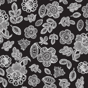 Lace flowers and leaves white on black 