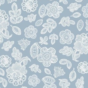 Lace flowers white on pastel blue 