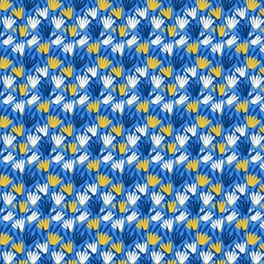 Simple flowers in blue, yellow, and white colors