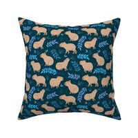 Wild animals - sweet capybara friends and lush jungle leaves blue beige on navy