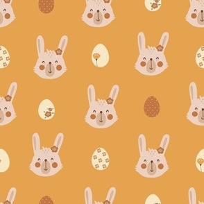 Cute rabbit faces on yellow