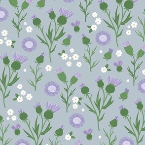 Thistles blossom romantic Scandinavian style flower garden thistle and daisy design green purple lilac on cool gray 
