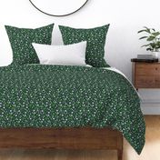 Thistles blossom romantic Scandinavian style flower garden thistle and daisy design green purple lilac on pine green