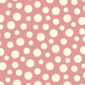 cream stitched circles on pink 