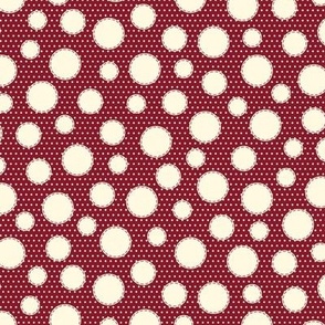 dark red stitched circles on cream 