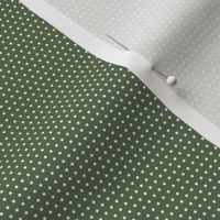 small cream dots on green 