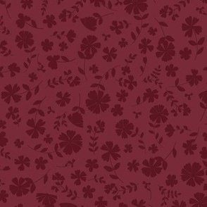 vintage flowers silhouette on dark red