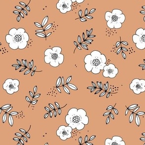 The boho garden romantic buttercup blossom and leaves vintage botanical nursery design on moody coral sienna