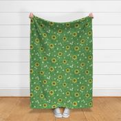 Block Print Sunflowers and Daisies on Lawn Green (large scale) | Garden fabric print on linen texture, rustic block print flowers, hand printed pattern, boho floral, spring fabric, Easter fabric in yellow and green.