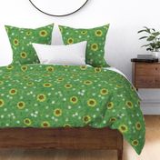 Block Print Sunflowers and Daisies on Lawn Green (large scale) | Garden fabric print on linen texture, rustic block print flowers, hand printed pattern, boho floral, spring fabric, Easter fabric in yellow and green.
