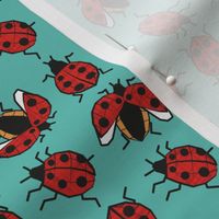 Small scale // Geometric ladybugs // mint background red and orange ladybird beetles insects