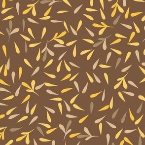 small brown and yellow leaves on brown 