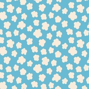 small silhouette flowers cream on blue 