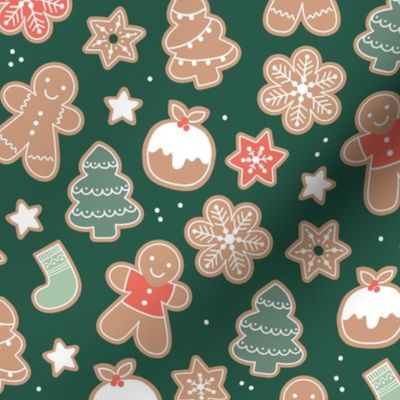 Vintage Christmas cookies - Seasonal bakery gingerbread stars christmas trees pudding and snow flakes dough and glazing green red mint on pine green 
