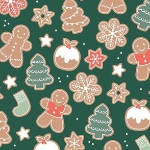 Vintage Christmas cookies - Seasonal bakery gingerbread stars christmas trees pudding and snow flakes dough and glazing green red mint on pine green 