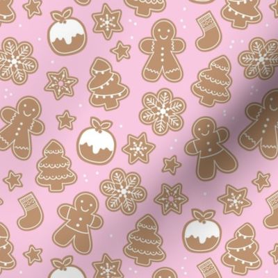 Christmas cookies seasonal baked ginger bread men christmas trees stars snow flakes and pudding cookie dough pink girls