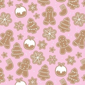 Christmas cookies seasonal baked ginger bread men christmas trees stars snow flakes and pudding cookie dough pink girls
