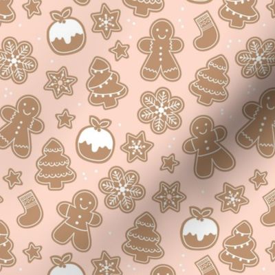 Christmas cookies seasonal baked ginger bread men christmas trees stars snow flakes and pudding cookie dough soft blush