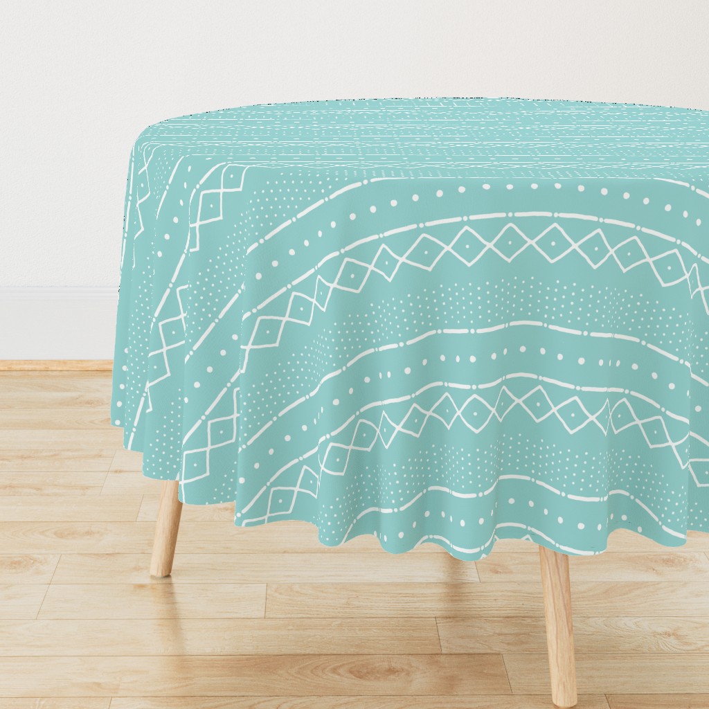 Mudcloth II (Petite) in white on turquoise