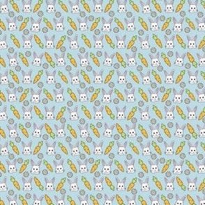 XS - Bunnies with carrots, and daisies on blue background