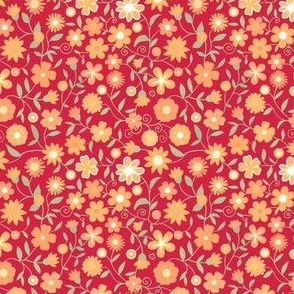 Ditsy orange flowers on red