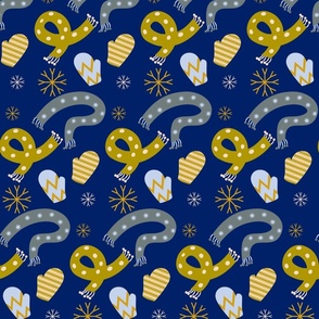 scarves and mittens on blue background