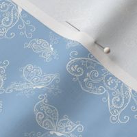 elegant thin white butterflies on a blue background gentle seamless pattern