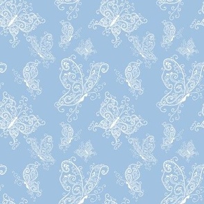 elegant thin white butterflies on a blue background gentle seamless pattern